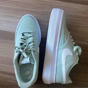 Nike Court Vision Alta leather platform sneakers in mint green and white